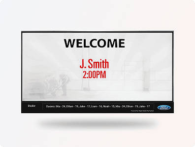 A digital Welcome Board in a car dealership lobby, greeting a scheduled sales or service customer by name. A digital Welcome Board in a car dealership lobby, greeting a scheduled sales or service customer by name.