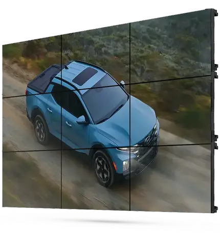 Showroom Digital Signs 6 Video wall displaying dealership marketing and performance content.
