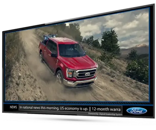 Showroom Digital Signs 11 Showroom TV displaying dealership specials and product videos.